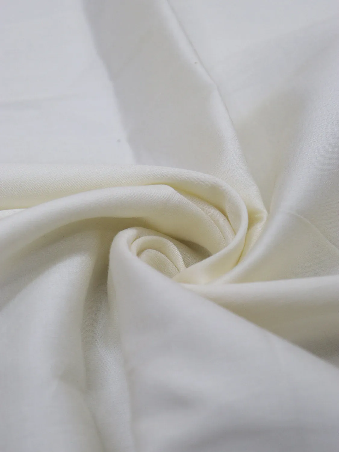 Pure Comfort: Off White Cotton Fabric for Versatile Apparel