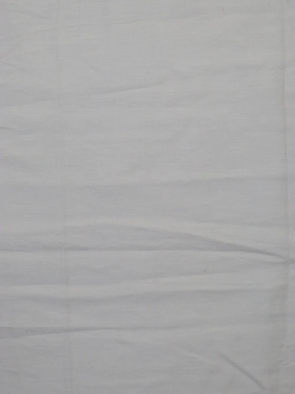 Pure Comfort: Off White Cotton Fabric for Versatile Apparel