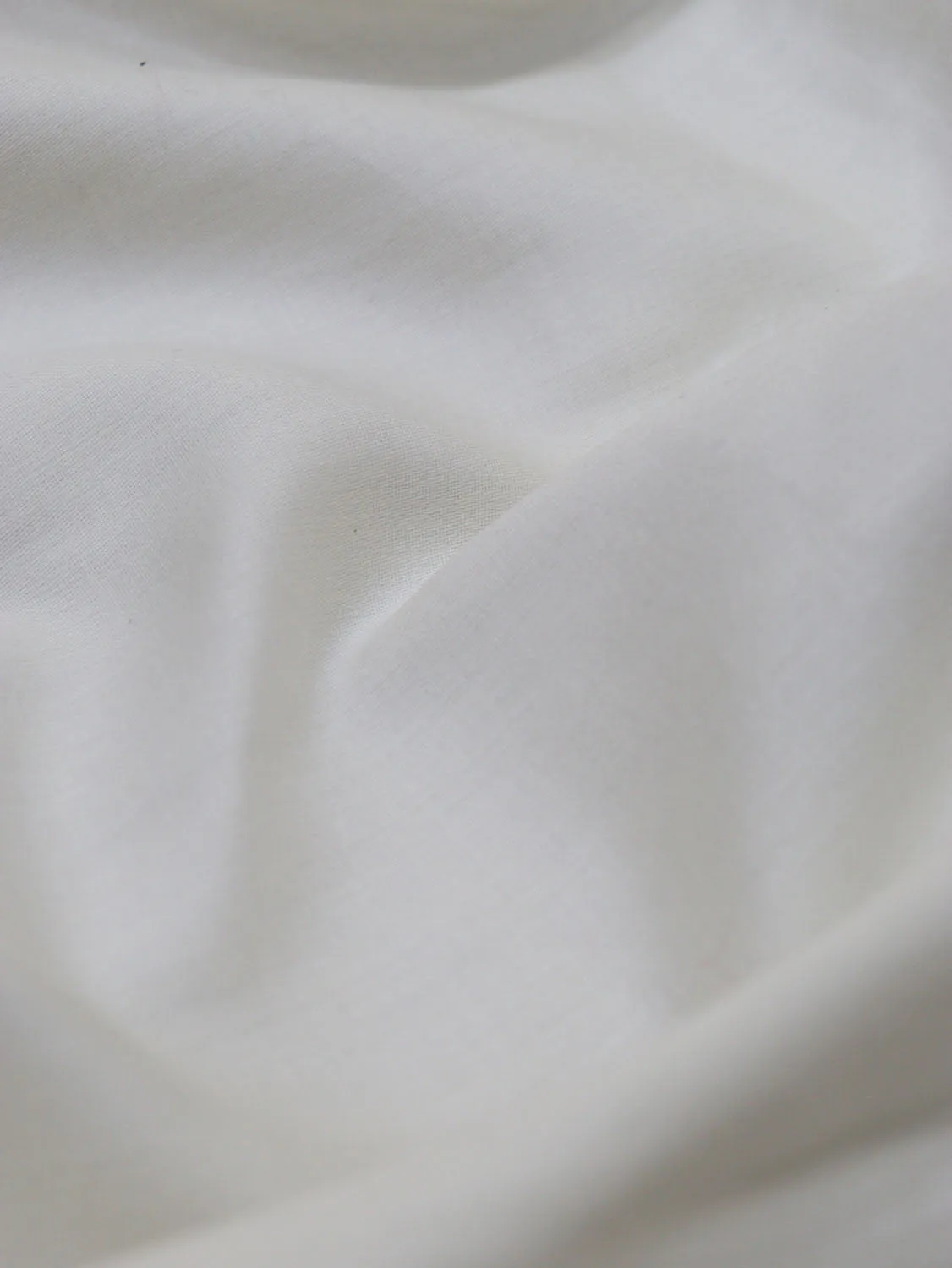 Pure Comfort: Off White Cotton Fabric for Versatile Apparel